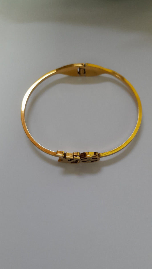 Lv Gold Bangle